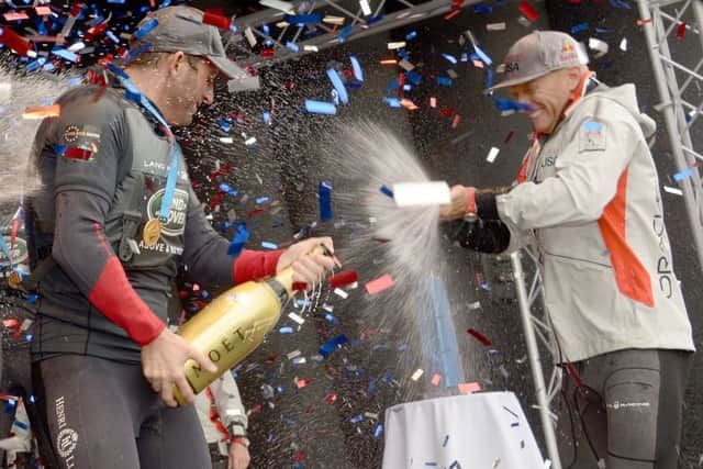Sir Ben Ainslie of team Land Rover BAR celebrates their win with Jimmy Spithill of Oracle Team USA. Picture: Paul Jacobs (160270-121)
