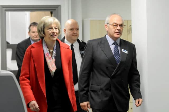 Then home secretary Theresa May visiting the University of Portsmouth  with Simon Hayes then Police and Crime Commissioner for Hampshire Constabulary to launch the specials cyber crime project in January Picture: Sarah Standing (160101-1003)