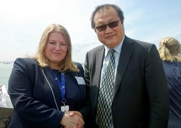 Councillor Donna Jones, leader of Portsmouth City Council, with  Jin Xu, minister counsellor of the economic and commercial office of the Chinese Embassy, at Southsea Castle during the Portsmouth America's Cup World Series