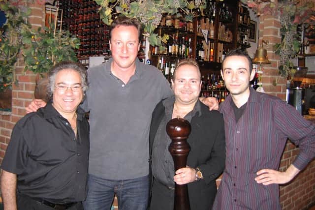 From left, 
Giuseppe Mascia, David Cameron, Christain Mascia, Luca Adamo
