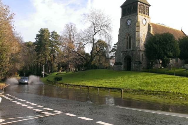 Flooding at the start of the A32 as it joins with School Road, Wickham