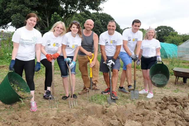(L-r) Rachel Lowrey, Chantelle Stokes, Sally MacPherson, Simon Bedford-Smith from Give, Gain and Grow, Adrian Moore, Lloyds Bank director for the area, Jack Blaker and Viv Thomas