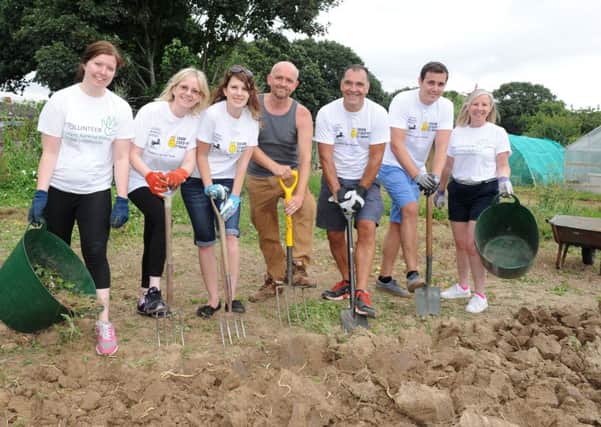 (L-r) Rachel Lowrey, Chantelle Stokes, Sally MacPherson, Simon Bedford-Smith from Give, Gain and Grow, Adrian Moore, Lloyds Bank director for the area, Jack Blaker and Viv Thomas