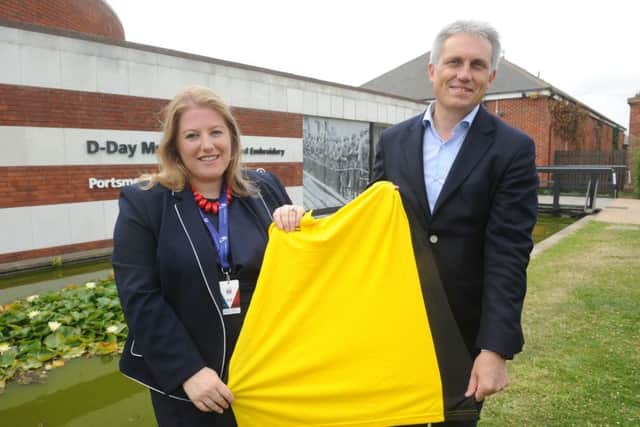 Councillor Donna Jones with the Mayor of Caen Joel Bruneau and the Tour De France yellow jersey.
Picture Ian Hargreaves (160987-10)