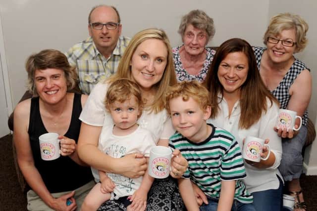 Club members, back row, from left, John Burton, 62, Pat Mathews, 81, and Denise Burton, 58. Front, from left, Michelle Smith, 46, Victoria Steel-Page, 41, with her sons Fletcher, one, Henry, five, and her sister Tracy Ramsey, 38
Picture: Sarah Standing (161042-7274)
