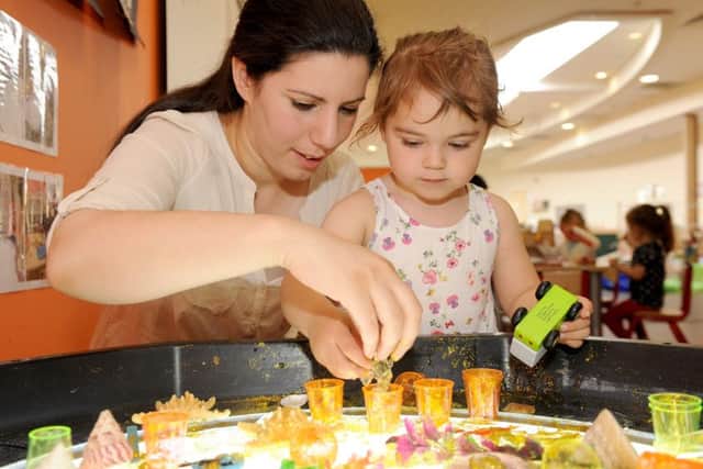 Owner Rahma Derzi with Tatiana Terzakis, three, playing with the Under the Sea jelly at Monkey Puzzle in Elm Grove
Picture: Sarah Standing (161046-9386)