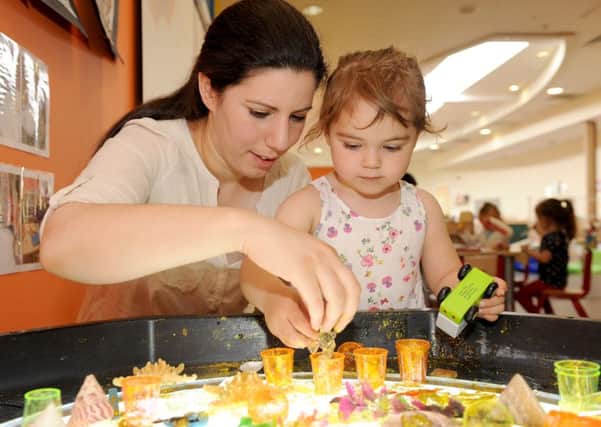 Owner Rahma Derzi with Tatiana Terzakis, three, playing with the Under the Sea jelly at Monkey Puzzle in Elm Grove 

Picture: Sarah Standing (161046-9386)