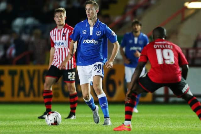Adam May on the ball for Pompey at Exeter in the JPT last September. Picture: Joe Pepler