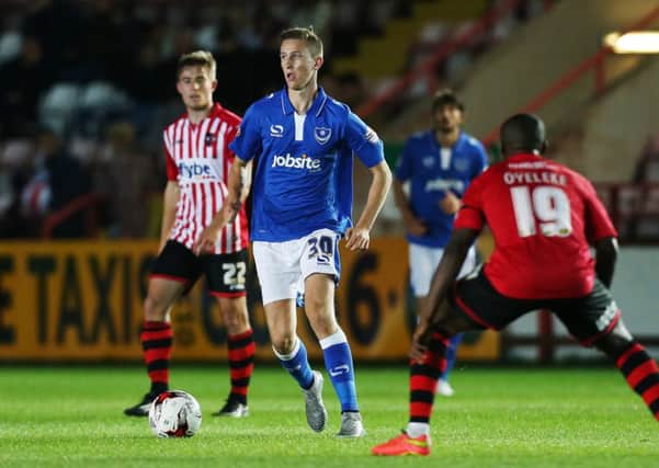 Adam May on the ball for Pompey at Exeter in the JPT last September. Picture: Joe Pepler