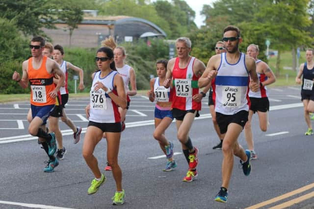 Emma Montiel alongside club-mate Shaun Newton, with Nicole Ainsworth, number 371, just behind
