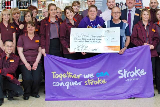 The Broadcut Store presented a cheque for Â£11, 777.76 to The Stroke Association