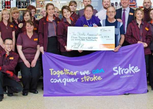 The Broadcut Store presented a cheque for Â£11, 777.76 to The Stroke Association