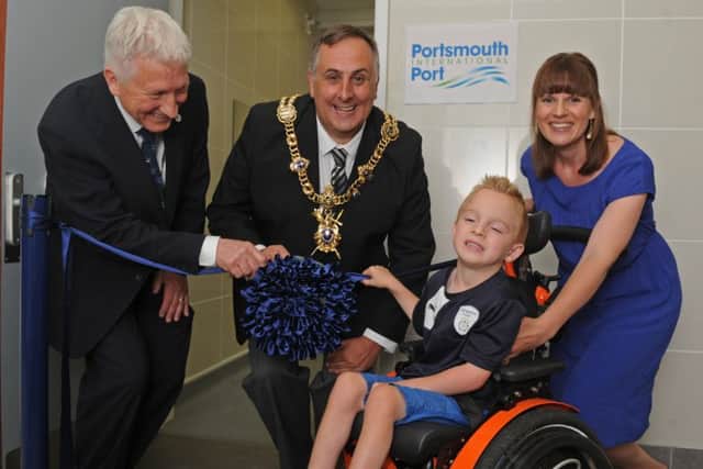 Hadley Brisdion and his mum Sarah with Port Director Martin Puttnam and The Lord Mayor of Portsmouth, Councillor David Fuller