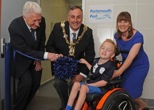 Hadley Brisdion and his mum Sarah with Port Director Martin Puttnam and The Lord Mayor of Portsmouth, Councillor David Fuller