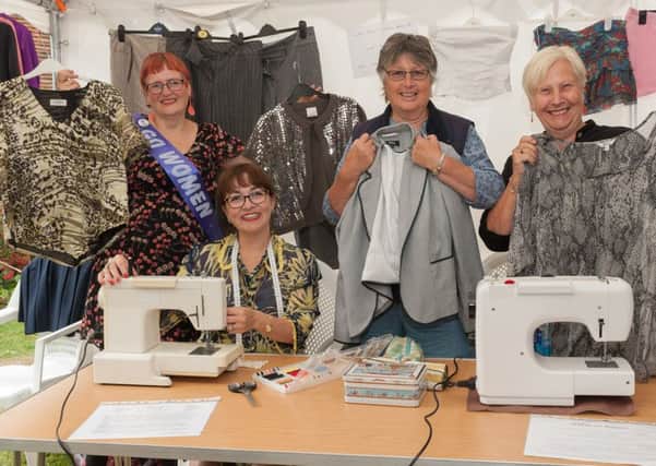 From the left are Tandy Powell, Maria del Carmen Stones, Christine Purton and Penny OCallaghan with some of the items to swap at the Swish Rail and Maria was even making while you wait alterations  Pictures: Keith Woodland (160999-004)