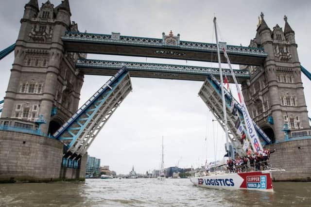 PRIDE PSP Logistics skippered by Max Stunell, from Portsmouth, sailing under Tower Bridge Picture: Clipper Race PR