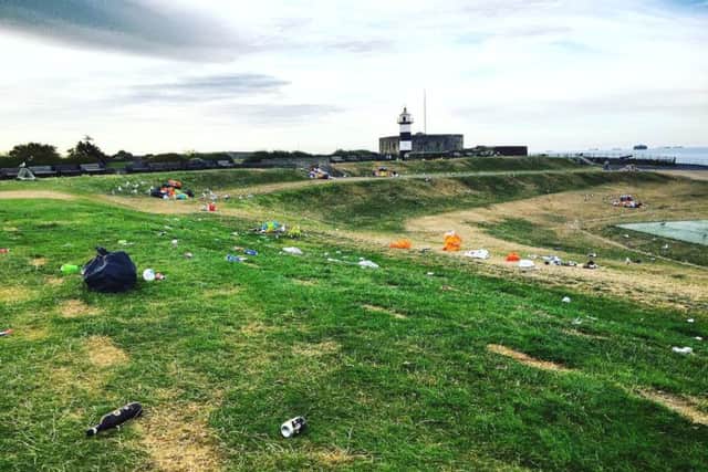 Litter left behind after the concert at the Bandstand field on Southsea Common on Sunday Picture: Sarah Parham