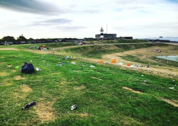 Litter left behind after the concert at the Bandstand field on Southsea Common on Sunday Picture: Sarah Parham