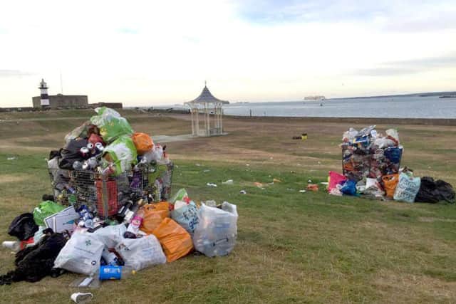 Piles of rubbish after the concert at the bandstand