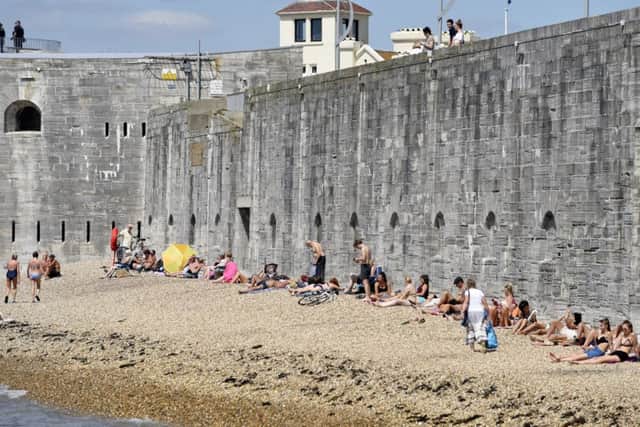 Sunbathers on Southsea beach 

Â© Solent News & Photo Agency
UK