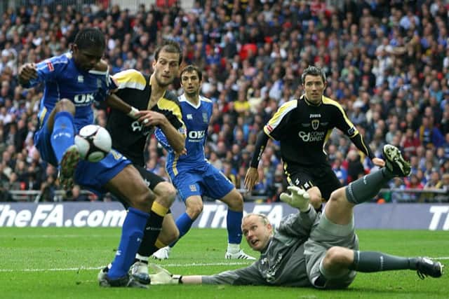 Nwankwo Kanu scores Pompey's winning goal in the 2008 FA Cup final against Cardiff at Wembley