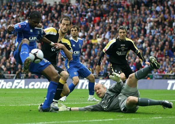Nwankwo Kanu scores Pompey's winning goal in the 2008 FA Cup final against Cardiff at Wembley