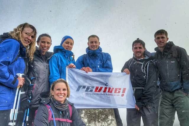 Tom Vanner and friends at the top of Ben Nevis in Scotland