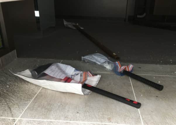 Sledgehammers left at Ernest Jones where thieves stole a 'significant' amount of jewellery on July 26. Picture: Ben Fishwick