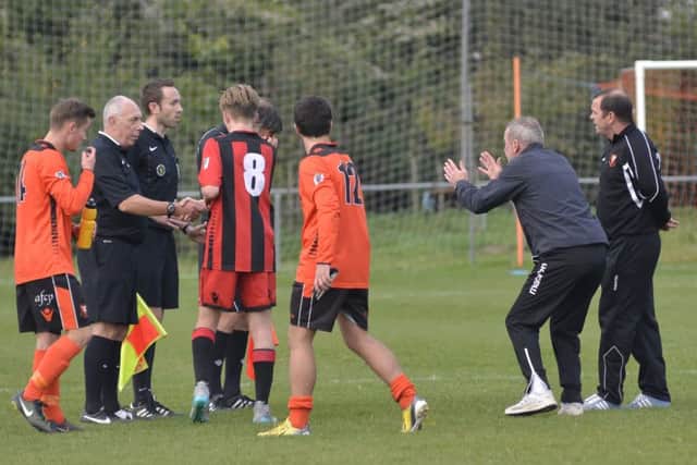 AFC Portchester boss Graham Rix, second from right, goes up against former Royals colleague and newly-appointed Horndean manager Michael Birmingham, far right, at Wicor Rec tonight          Pictures: Neil Marshall