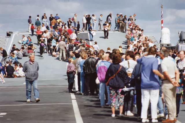 Visitors waiting to sample the flight deck of HMS Ark Royal in 1992