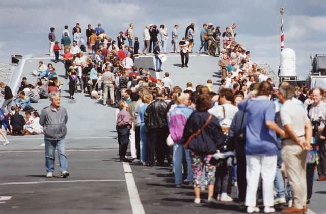 Visitors waiting to sample the flight deck of HMS Ark Royal in 1992