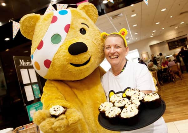 Debenhams in Portsmouth kicks off its Children in Need fundraising

with Pudsey and Sandra Smith Picture: Patrick Olner