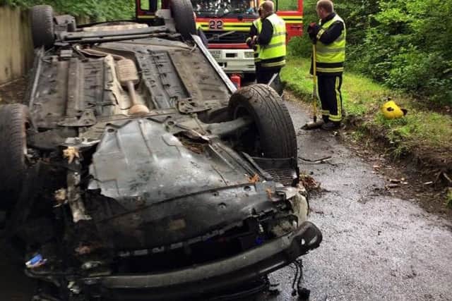 An upside-down car in Mayles Lane, Wickham Picture: Hampshire Fire and Rescue Service / Wickham Fire Station