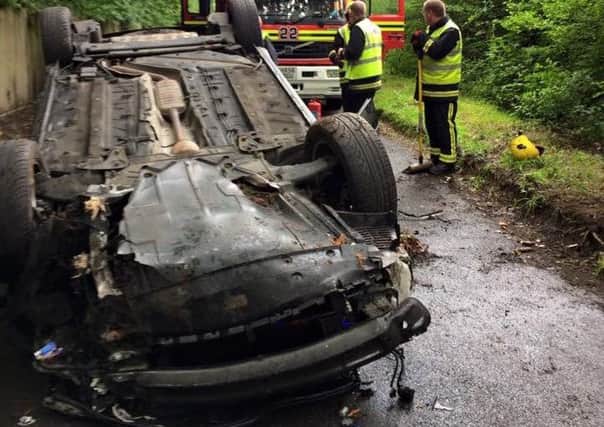 An upside-down car in Mayles Lane, Wickham Picture: Hampshire Fire and Rescue Service / Wickham Fire Station