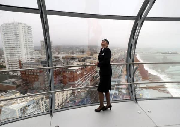 British Airways Global Ambassador Tina Burton looks out of the new British Airways i360 in Brighton, Sussex, as the "vertical pier in the sky" is set to give tourists a new view of Brighton's historic seafront on the site where one of its most famous attractions was built 150 years ago.
Picture: Steve Parsons/PA Wire