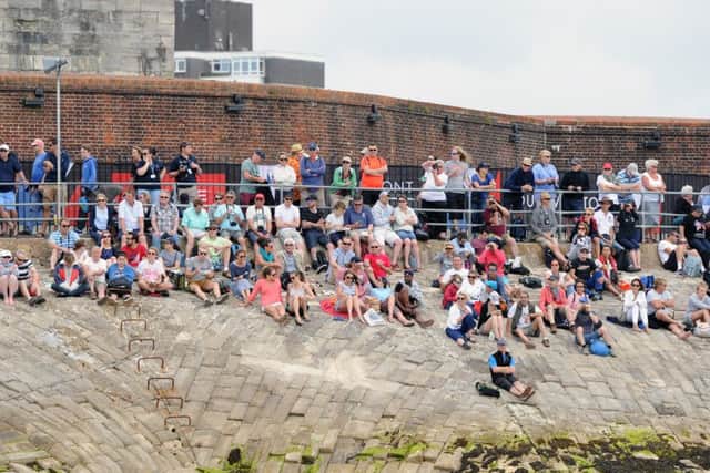 Crowds on Southsea seafront watching Races 4, 5 and 6 on Sunday Day 3 of the America's Cup World Series in Portsmouth.  Picture: Sarah Standing (161045-4900) PPP-160724-191408001