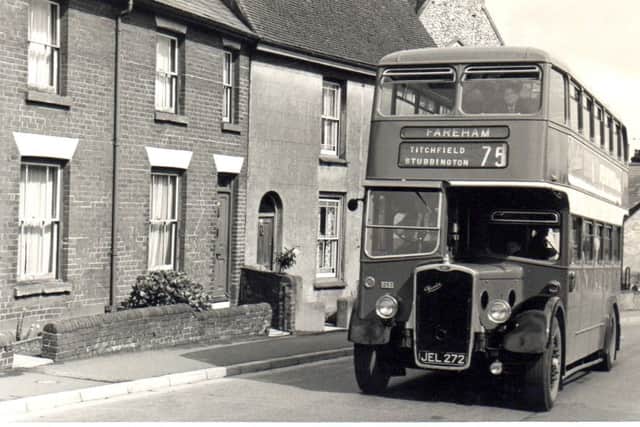 ROUTE Hartlands Road, Fareham. A bus passes houses where the current bus station stands, 1965