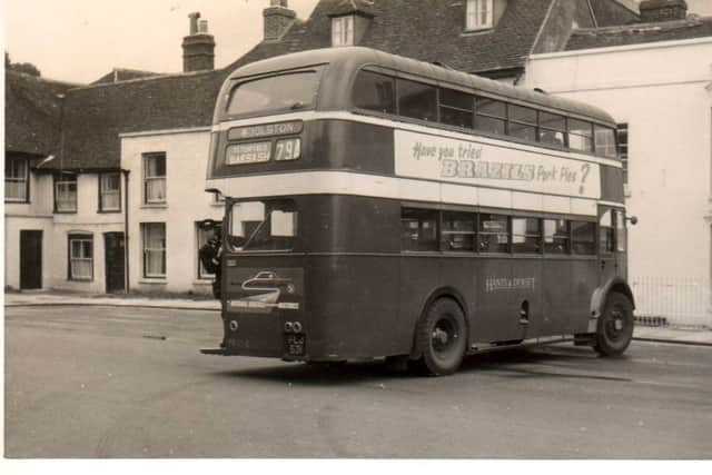 CONDUCTING A conductor supervising a turning in Titchfield Square, 1957