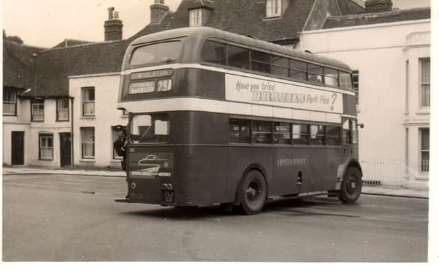 CONDUCTING A conductor supervising a turning in Titchfield Square, 1957