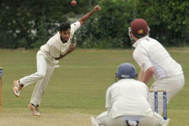 Sunny Bhimsaria took two wickets for Bishop's Waltham in the win against Hook. Picture: Mick Young (160759-02)