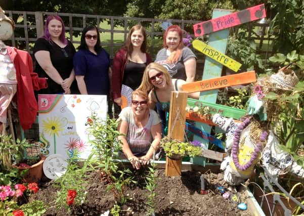 The first Adopt-a-plot group at the Southsea Greenhouse, who have planted a bee friendly garden, and the graduates from the Catch 22 scheme