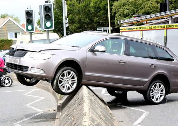A car became lodged on a traffic safety island in Stubbington this morning Picture: UKNIP