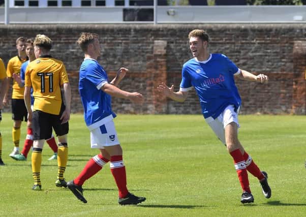 Harvey Bradbury celebrates his and Pompey Academy's second goal in today's 2-2 draw with Newport County   Picture: Neil Marshall