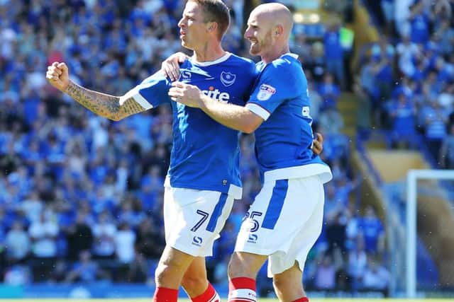 Carl Baker celebrates his goal with Drew Talbot Picture: Joe Pepler