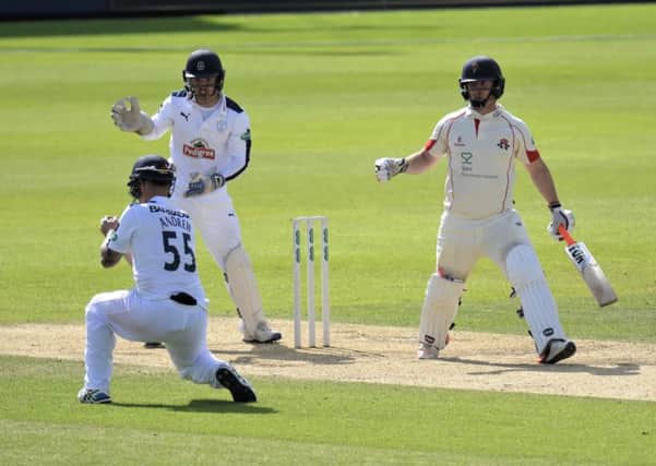 Gareth Andrew takes the catch to dismiss Steven Croft in Lancashires second innings. Picture: Neil Marshall