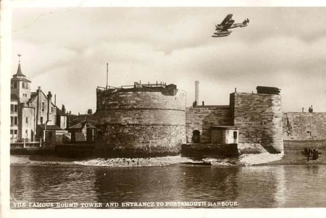 The Fairey Fremantle swoops over the Round Tower, Old Portsmouth