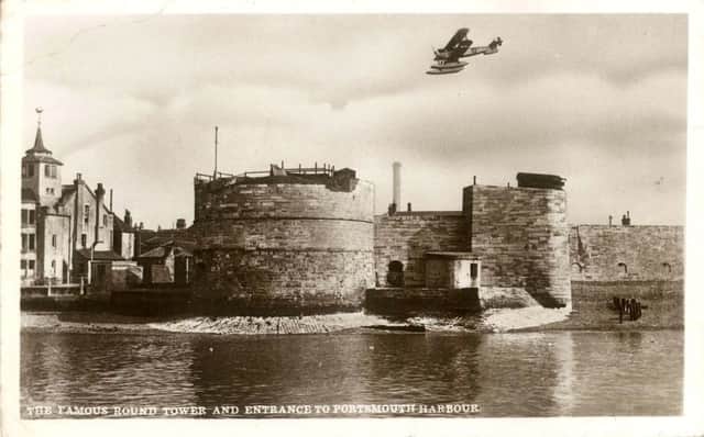 The Fairey Fremantle swoops over the Round Tower, Old Portsmouth