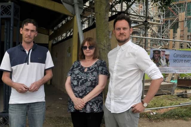 Residents Dave Leathley and Chris Evans at Wilmcote House with Councillor Stephen Morgan