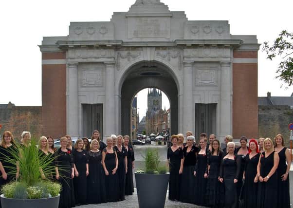 Portsmouth Military Wives Choir performing in front of the Menin Gate