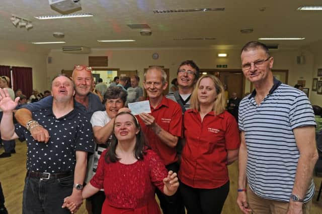 Founder Geoff Knipe, second left, with landlord and landlady Martin and Diane Munns and party goers at the Friday Night Disco held at Wallington Village Hall
Picture Ian Hargreaves (161094-1)